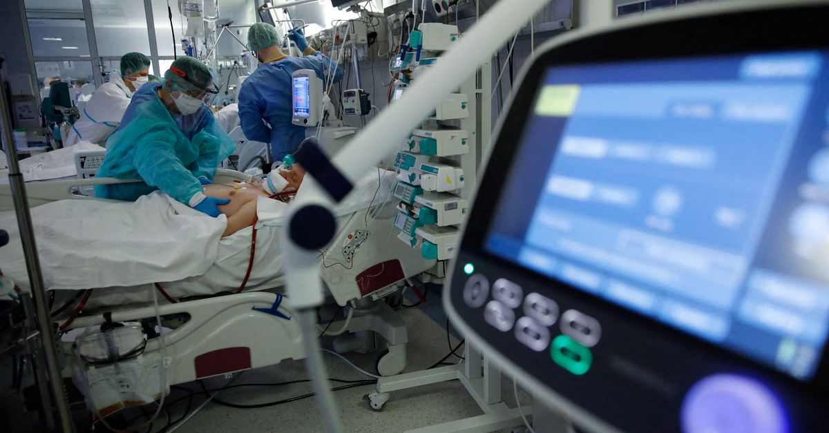 Poland reports new daily record of 57,659 COVID cases